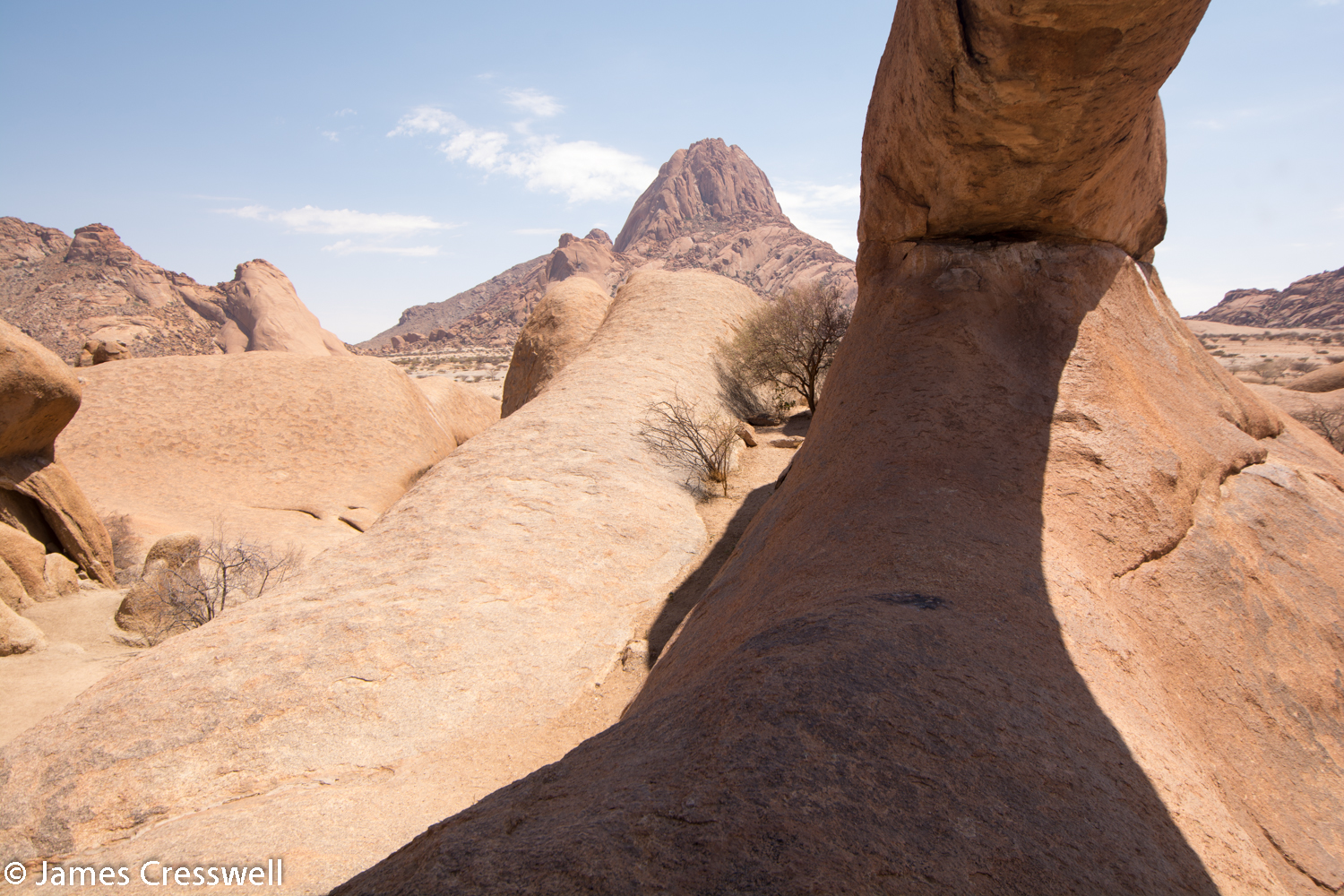 The view under an arch of Spitzkoppe granite, Namibia.