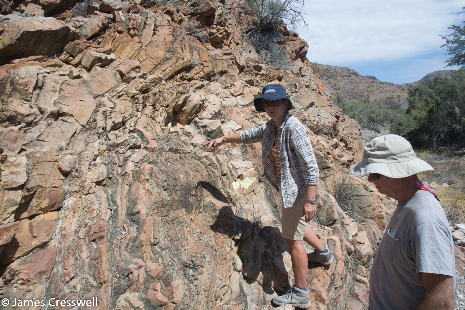 Nicole Grunnert points out folds in the carbonate rocks just above the Naukluft thrust fault