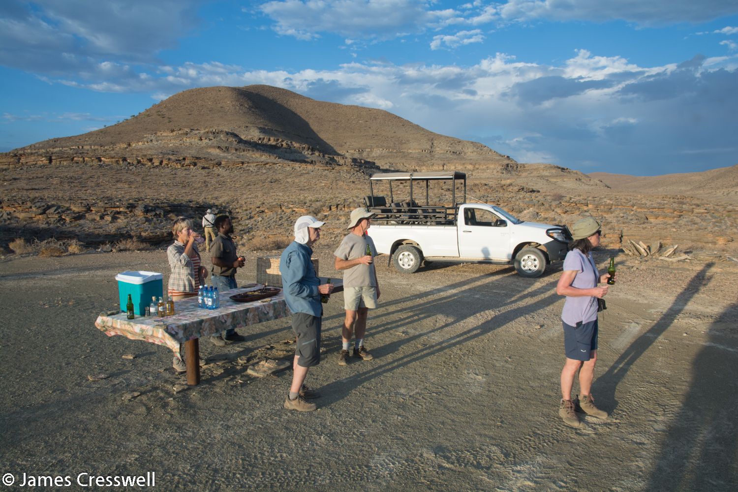Enjoying a sundowner drink at Zebra River, Namibia