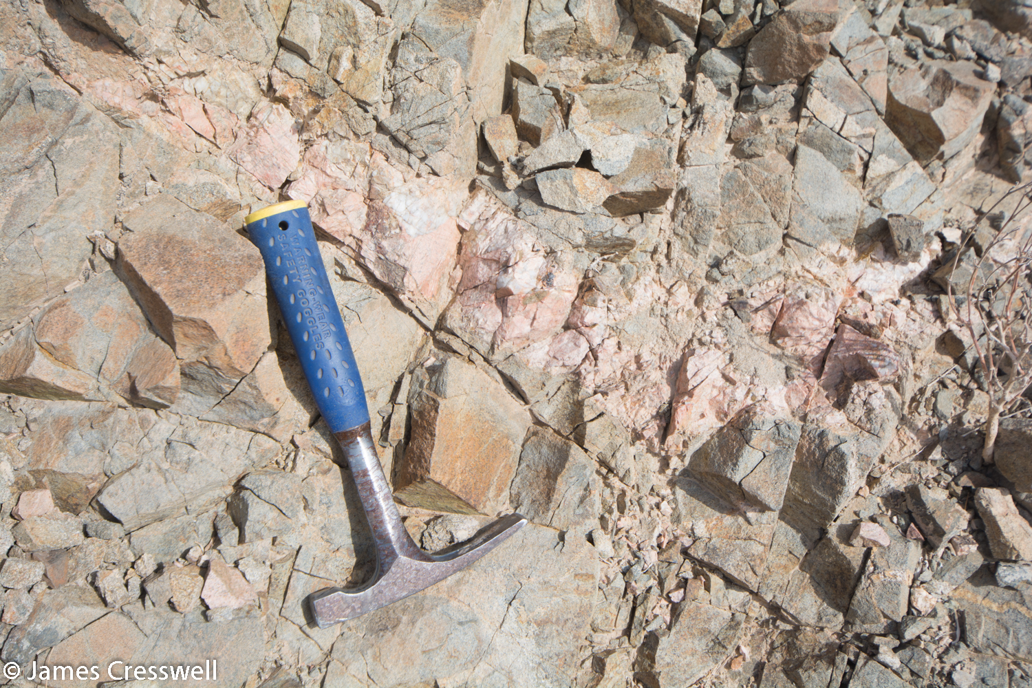 Precambrian pegmatite dyke cutting basalt - part of Oman's crystalline basement