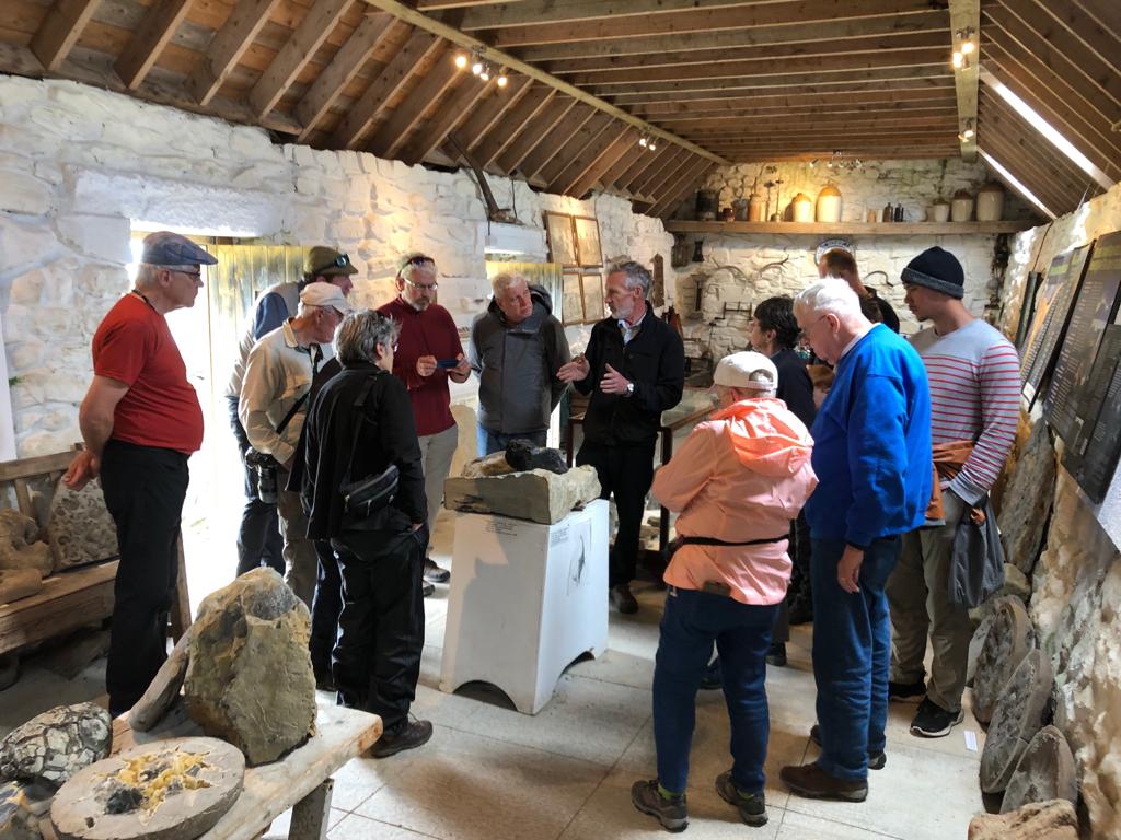 Dugald Ross explaining his fossils to our group in the Staffin Museum
