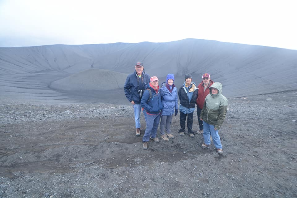 Group at the edge of a volcanic crater