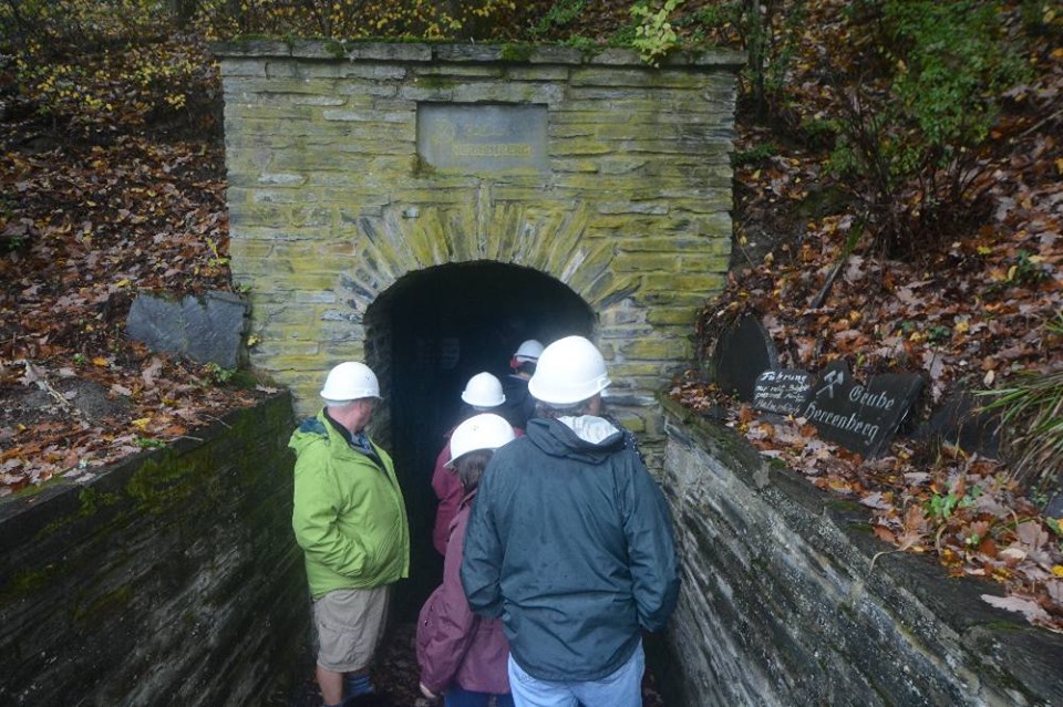 People at mine entrance