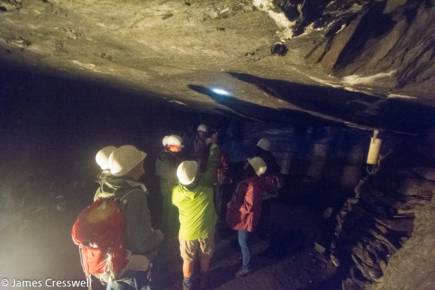 Group inside slate mine