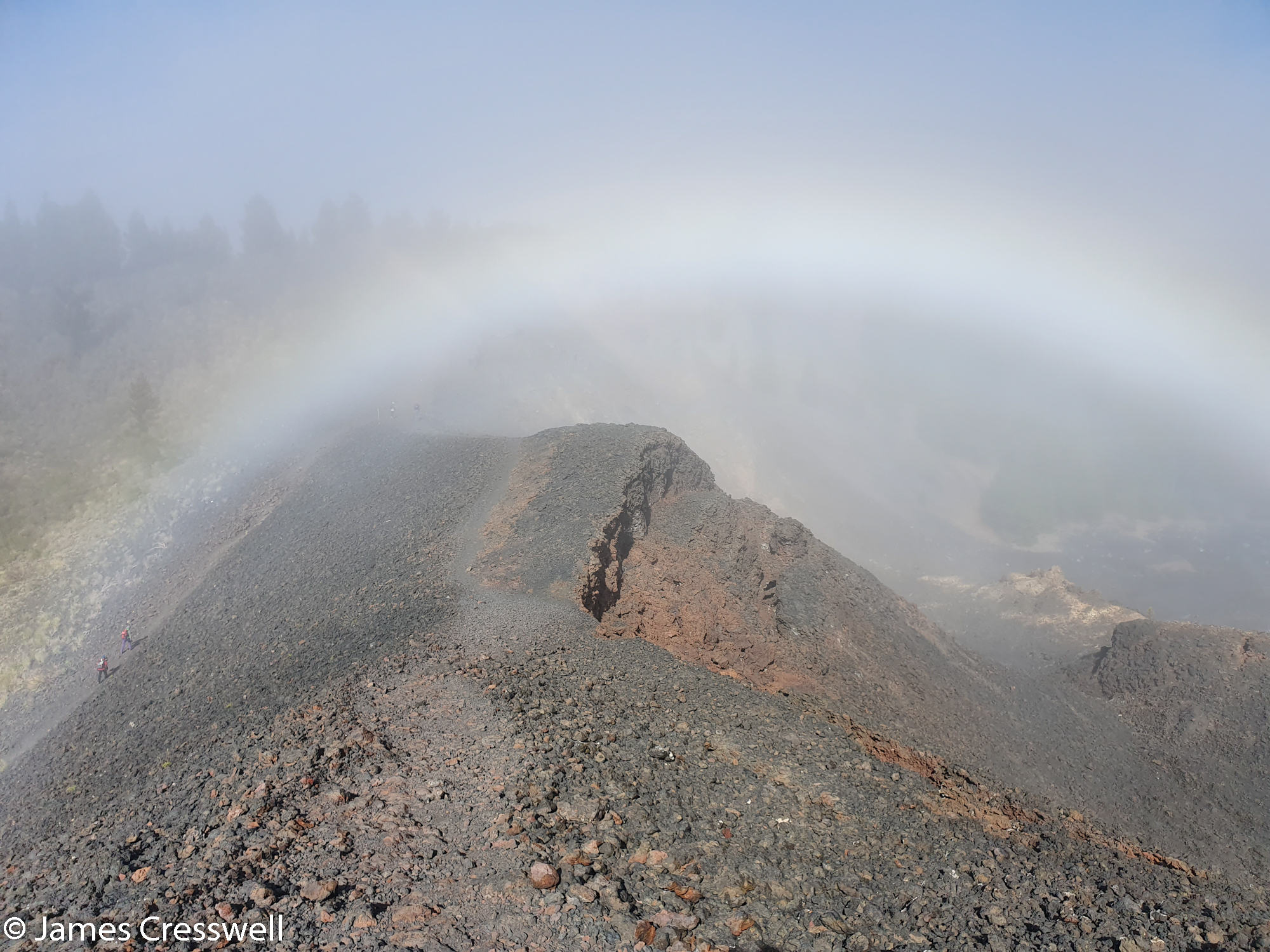 Rainbow over a volcanic landscape
