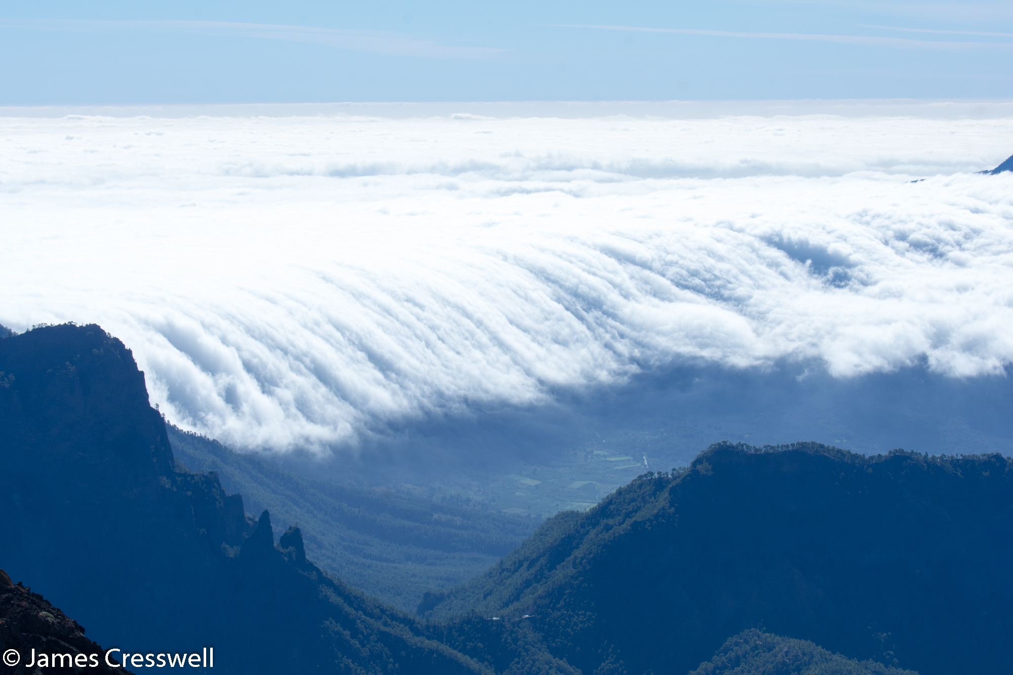 Clouds filling valley