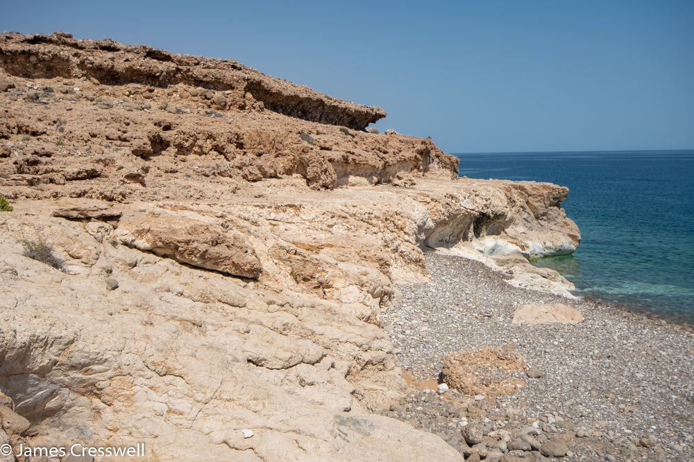 A photograph of a small stepped sea cliff