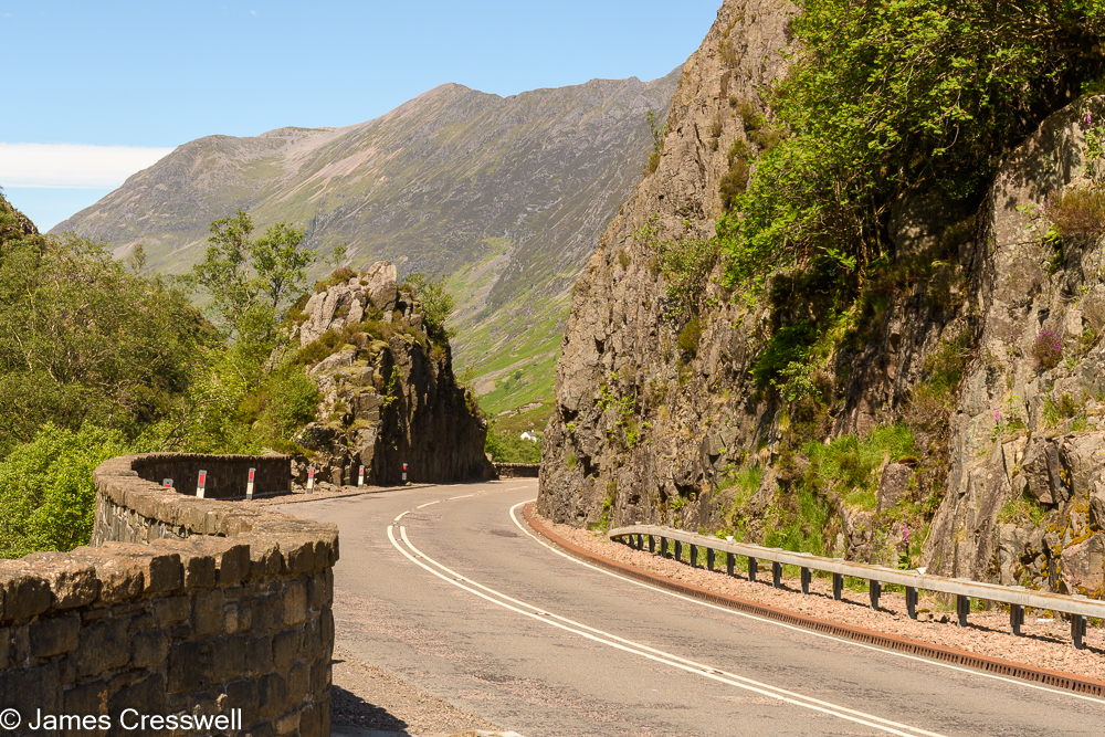 A road cuts through a dyke