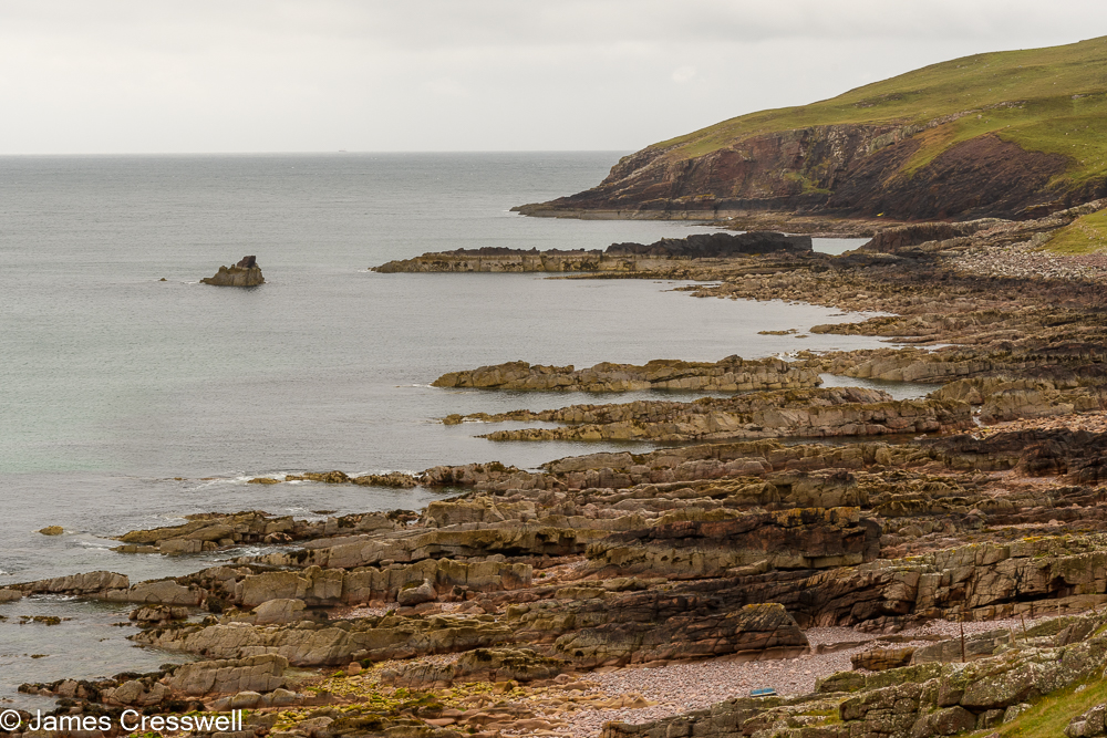 A coastline made up of layered rock