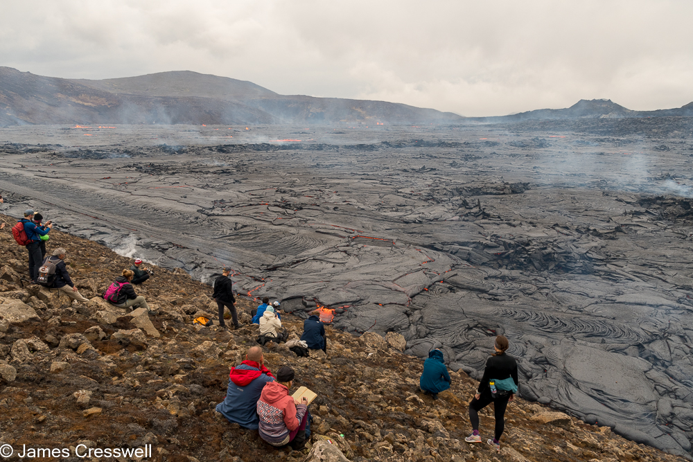 People watching lava