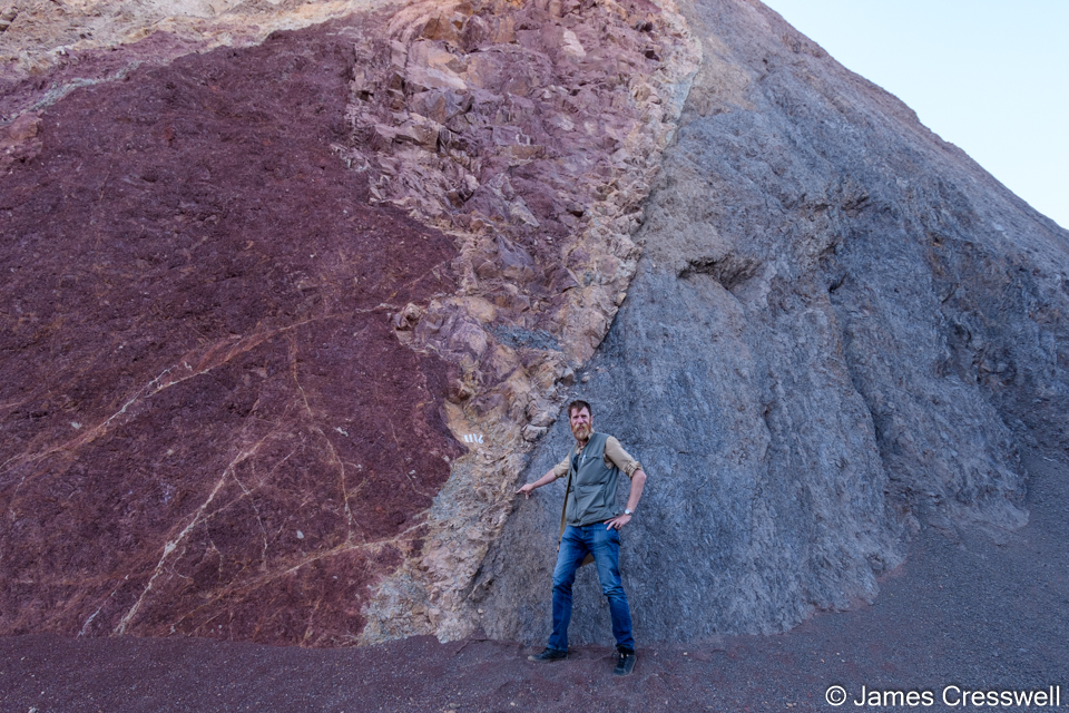 James pointing to the Tiz n'Tichka strike slip fault which is exposed in a recent road cut, near the Col du Tichka