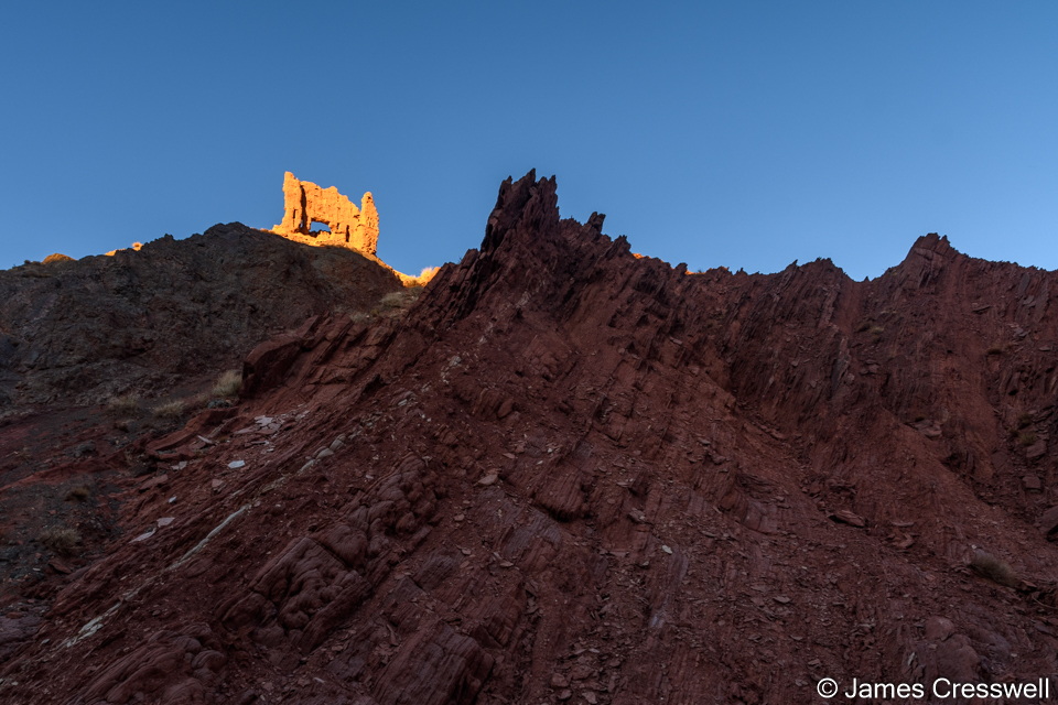 A watch tower guarding the approach to the Telouet salt mine, with Triassic strata in the foreground