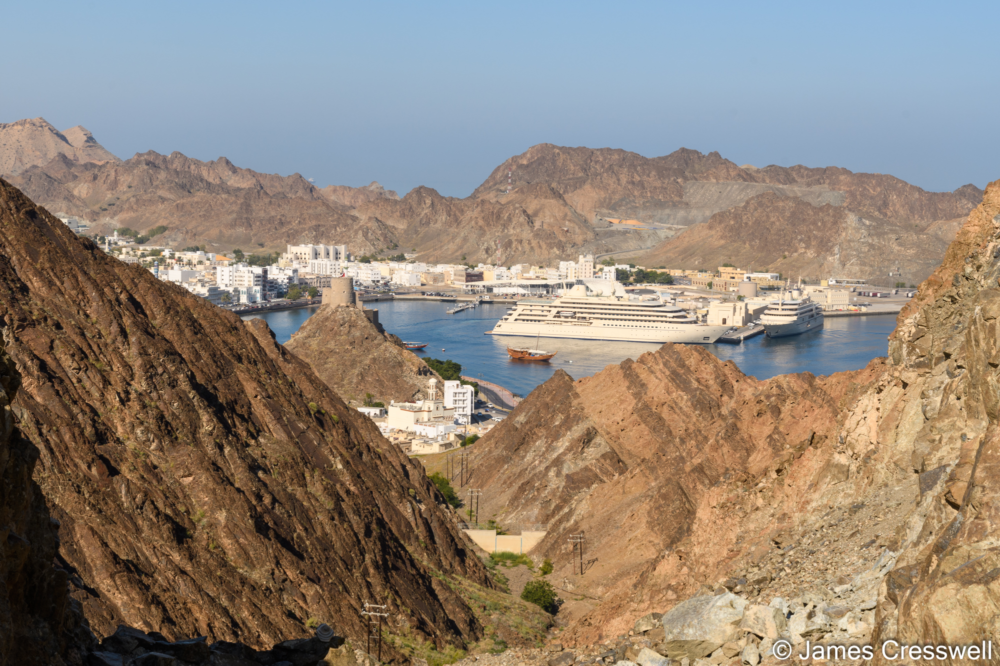 View of Muttrah Harbour with large yachts