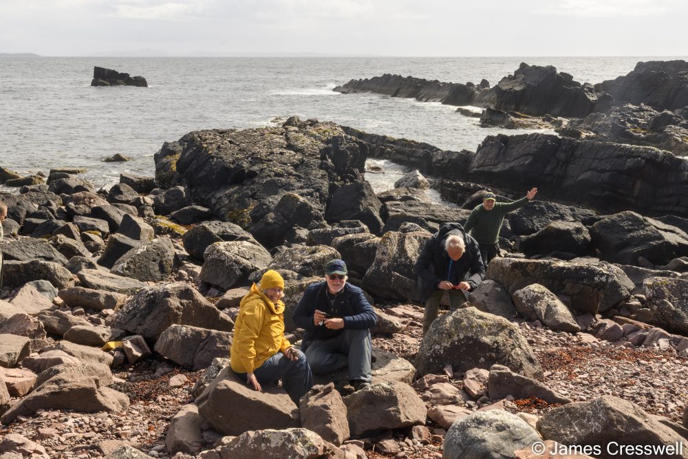 People on a rocky beach