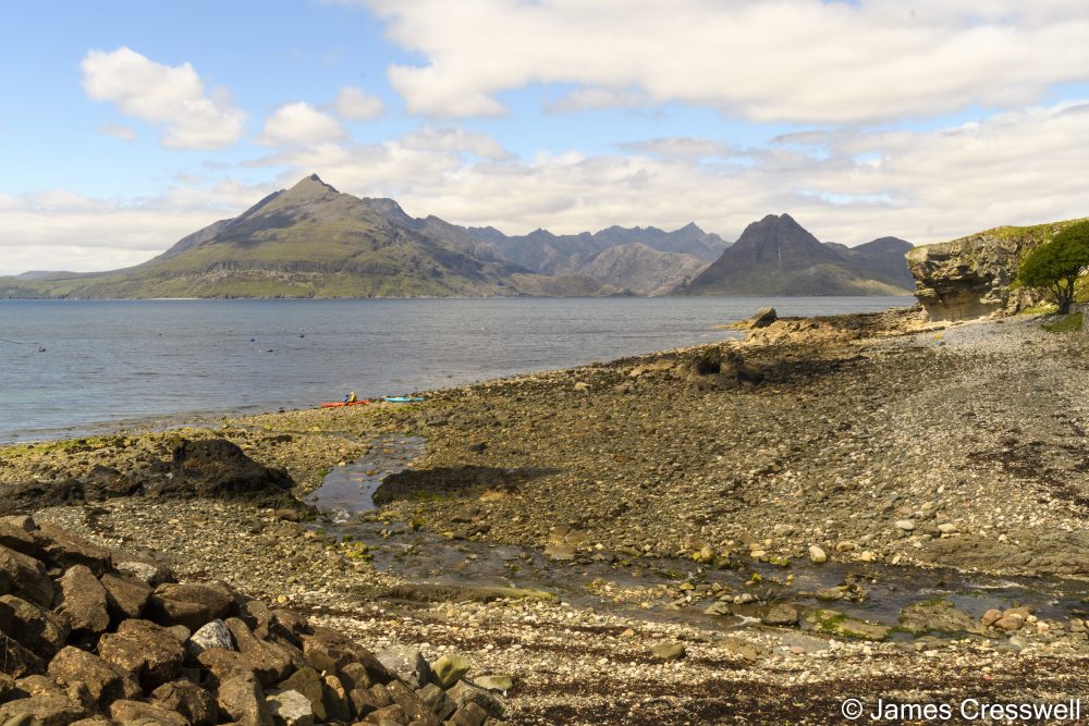 Beach with mountains in the background