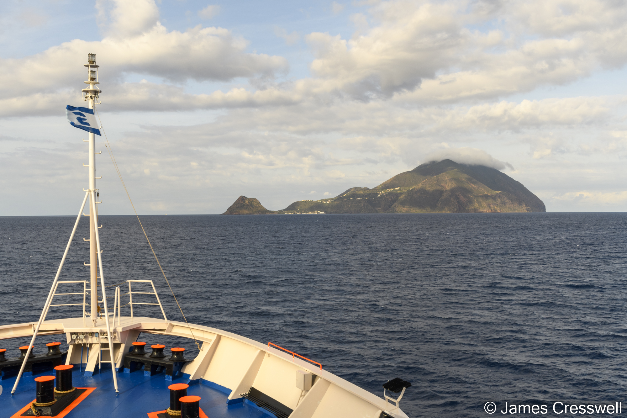A boat approaching an island