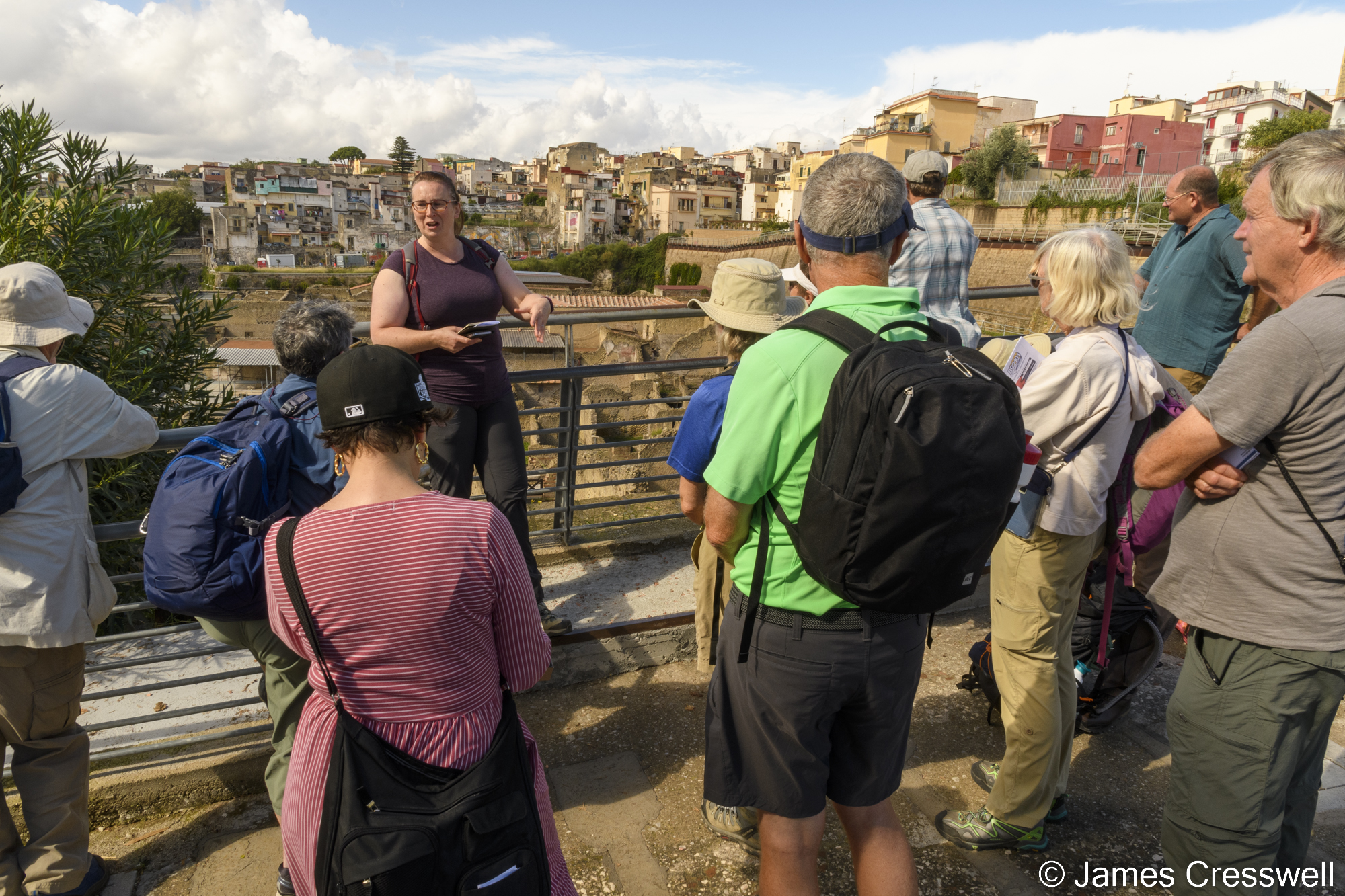 A woman talking to a group of people