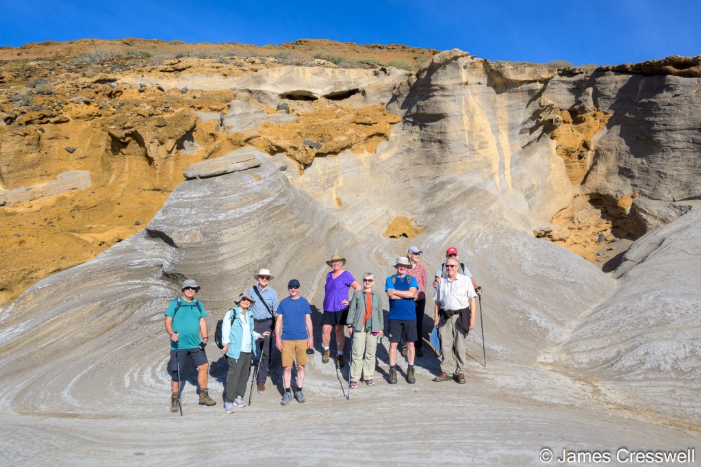 The GeoWorld Travel group standing on a ‘fossilised’ beach sand dune at the Amarilla Cone.