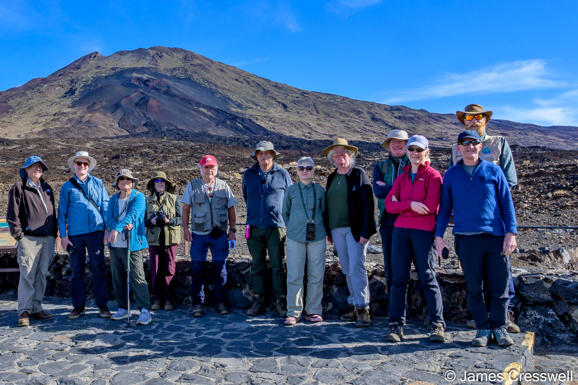 The GeoWorld Travel group at the Mirador de Chahorra. Behind them is Pico Viejo, a parasitic cone of the central Teide volcano.
