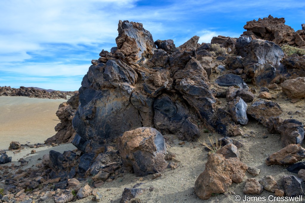Phonolite obsidian seen at San Jose pumice quarry. This obsidian lava flow was emitted from the summit of Teide around 600-900AD. 